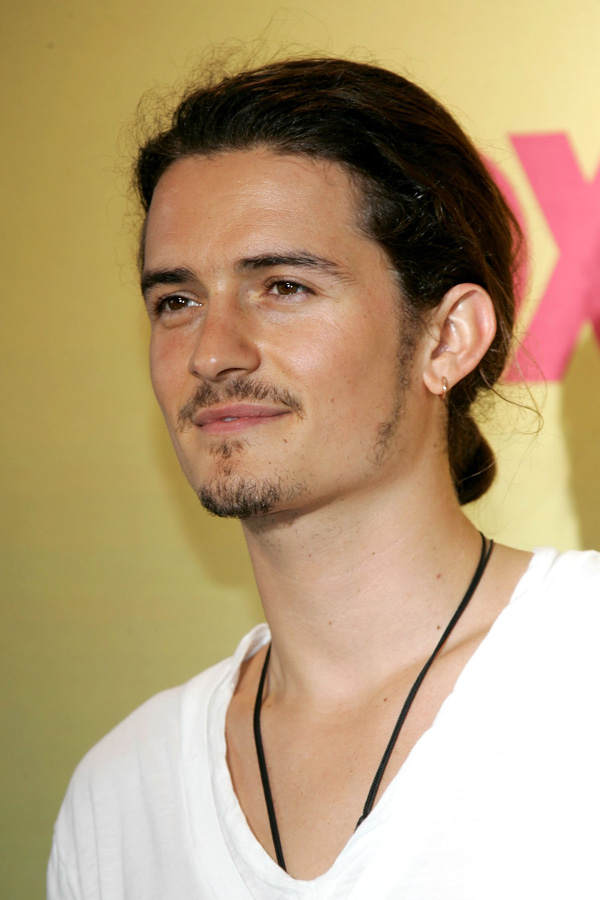 Orlando Bloom mit Zopf