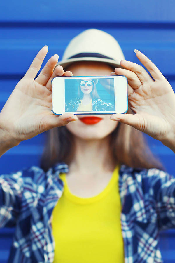 Der/Die Selfie-SpammerIn